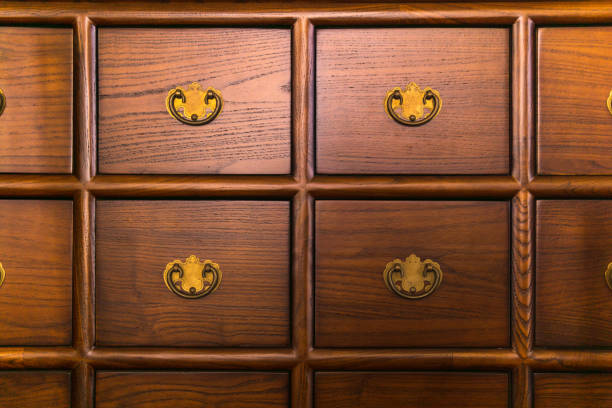 istock vintage card catalog cabinet, background, cataloging symbol 2159813032