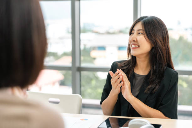 istock Asian business start up freelance people team analyzing statistics financial. Group Team of businesspeople man and woman Meeting Conference Discussion various topic Corporate Concept in office. 2159813484