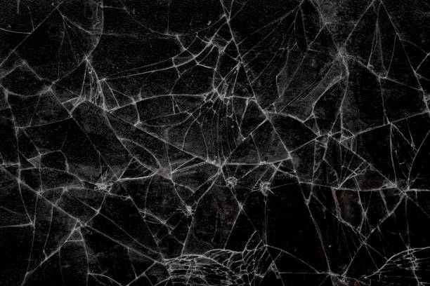 istock Cracked or damaged glass texture.  cracked glass background.  crack pattern 2159814763