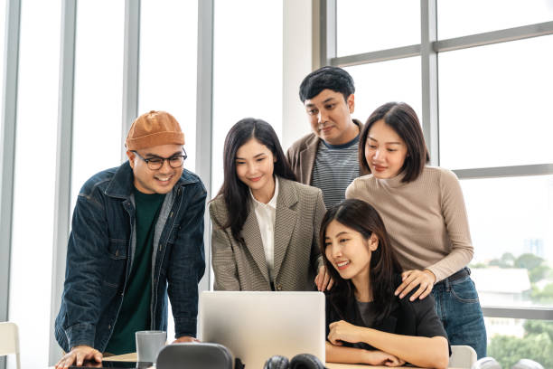 istock Asian business start up freelance people team analyzing statistics financial. Group Team of businesspeople man and woman Meeting Conference Discussion various topic Corporate Concept in office. 2159814810