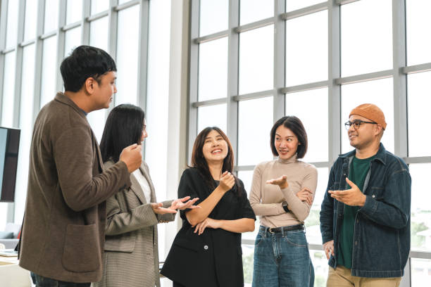 istock Asian business start up freelance people team analyzing statistics financial. Group Team of businesspeople man and woman Meeting Conference Discussion various topic Corporate Concept in office. 2159815307