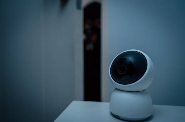istock Security camera.Thief in uniform black jacket various action housebreak. The Robber terrorism criminal escapes with balaclava and crowbar entering a house for stealing Housebreak at night 2159815807