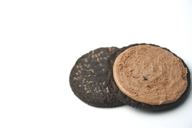 close up sandwich chocolate cookies isolated on white background