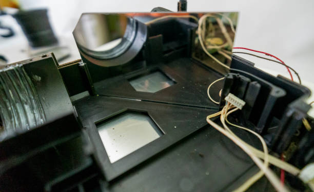 istock Video and multimedia projector open for maintenance with led lamp 2159817625