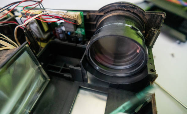 istock Video and multimedia projector open for maintenance with led lamp 2159817636