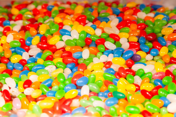 Multi Colored Candies In Against White Background
