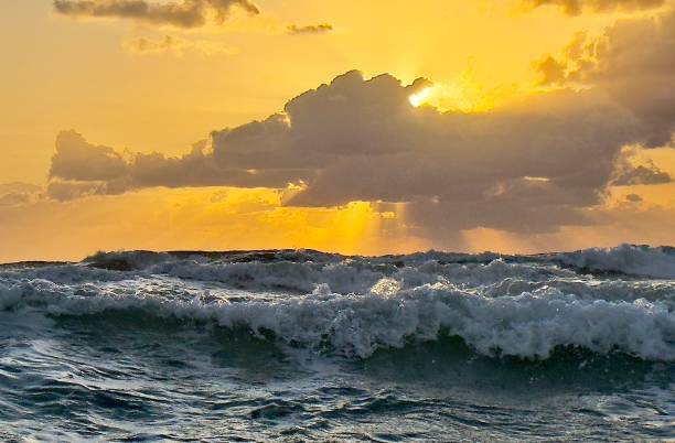 istock Sunrise over a beautiful tropical ocean 2159826976