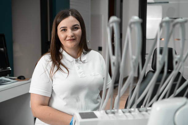 istock The doctor's gaze directed at the camera expresses openness and accessibility to professional advice, always ready to help you with any aspect of your oral health. 2159832834