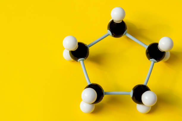 Molecular model structure of cyclopentane. A ring of carbon atoms. Chemical formula concept. Organic chemistry model that visualizes the bonds between atoms in 3D.