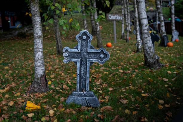 Creepy dark and spooky cemetery at night.