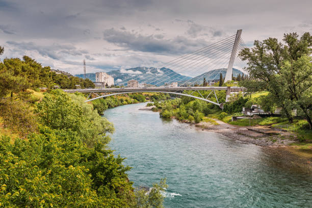 istock In Podgorica, Montenegro, the Moraca River serves as a captivating backdrop to the city's architecture and skyline, offering travelers a beautiful view of nature and historic buildings 2159846376