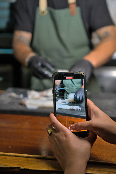 istock Content Creation in Action: Filming a Chef's Squid Preparation for Social Media 2159850363