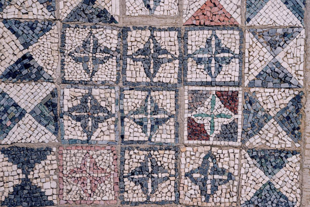 istock A mosaic tile floor with a pattern of squares and triangles 2159850458