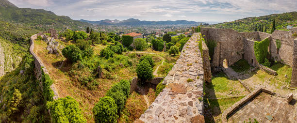 istock Ancient fortress ruins in Bar, Montenegro, perched on rugged mountains. 2159850463