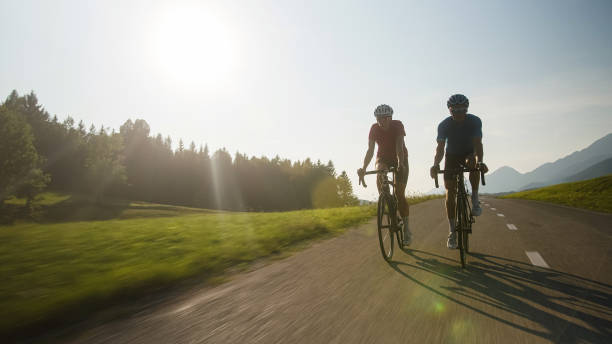 Riding a racing bike on a sunny spring afternoon. Personal perspective.