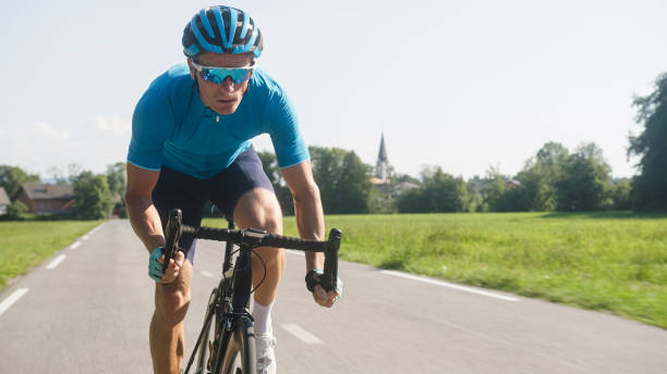 istock Man road cycling on race bike 2159855976