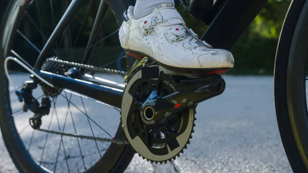 istock Male cyclist in white cycling shoes 2159856013
