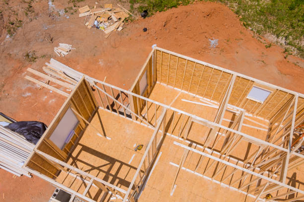istock Viewing construction work in progress on an unfinished house with wooden framing beams 2159856709