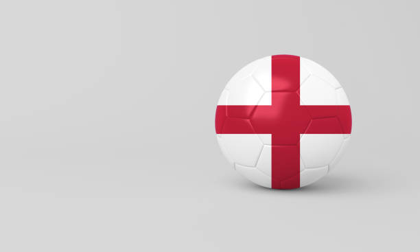A flag featuring the St George's Cross, flying in the wind on a summer's day.