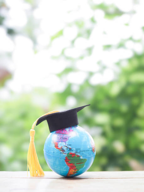 istock Earth globe with graduation hat. Copy space for text, Back to school, Education concept 2159871141