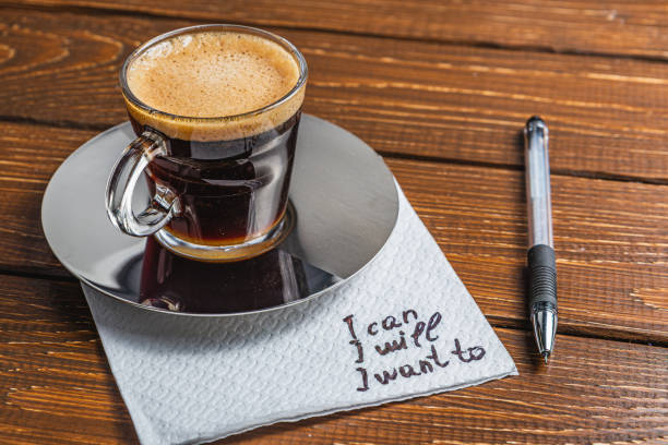 istock Hand written note on a coffee stained napkin with an empowe 2159871994