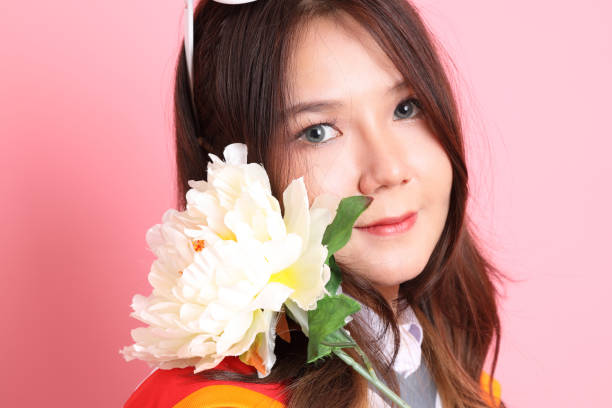 istock Girl with Graduation Gown 2159879103