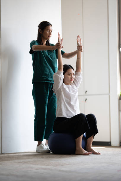 istock Chiropractic, physiotherapy and rehabilitation for young patient 2159881570