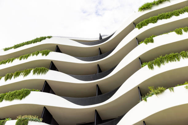 istock Closeup front view of new, modern apartment building, background with copy space 2159882441