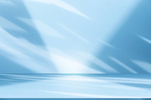 istock Wall interior background, studio, and backdrops show products. with shadow from window color white and blue light. background for text insertion and presentation of product 2159883740
