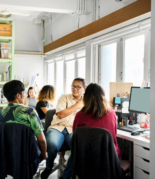 istock Businesspeople collaborating on new project in modern office 2159893575