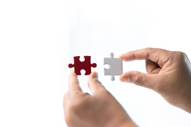 istock Developing strategic approach to each challenge in business is like piecing together jigsaw puzzle, solution fits into place with careful planning and steady hand, ultimately leading to success. 2159894579