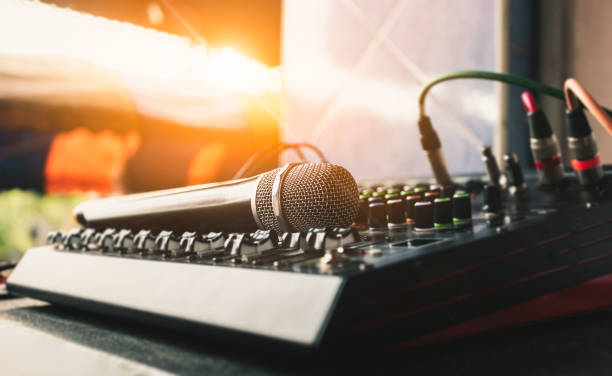 Close-up microphone and sound mixer in studio for sound record control system and audio equipment and music instrument.