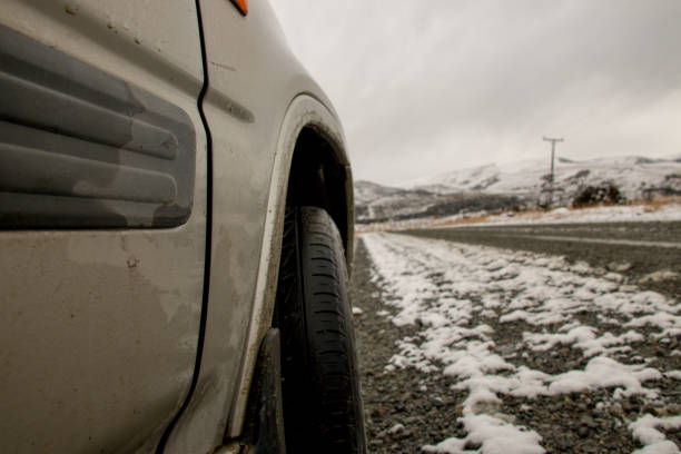Car on the side of a snowy road