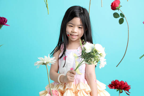 istock Girl with Flower 2159898938