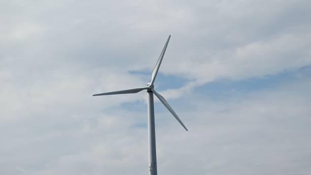 istock Wind turbines on the beautiful autumn meadow. 2159899991