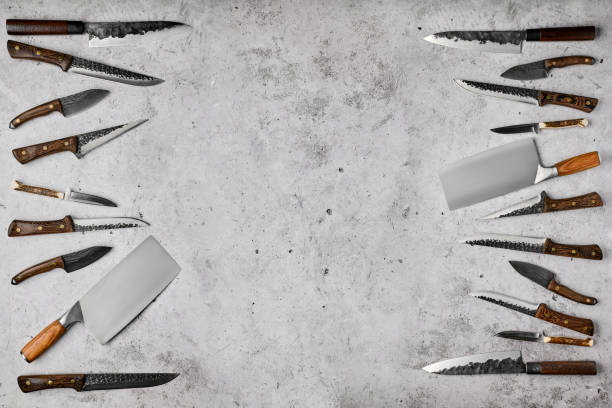 Overhead composition with different kinds of butcher's knives