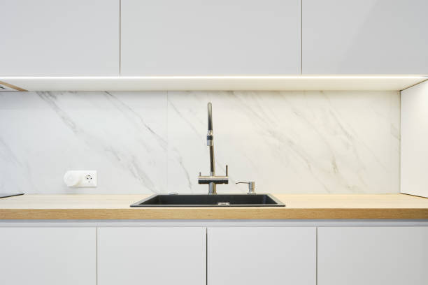 istock Water tap and sink in a modern kitchen 2159902178