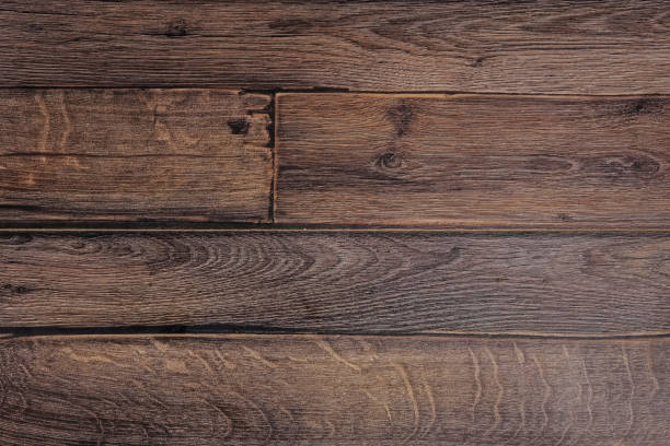 istock brown wooden board background 2159902199