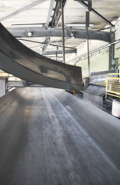 istock Belt conveyor in a coal fired heating plant, selective focusing. 2159911863