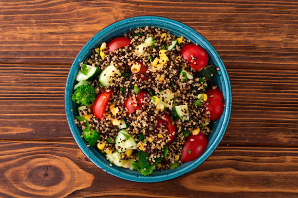 istock Fresh vegetable salad with quinoa 2159916572
