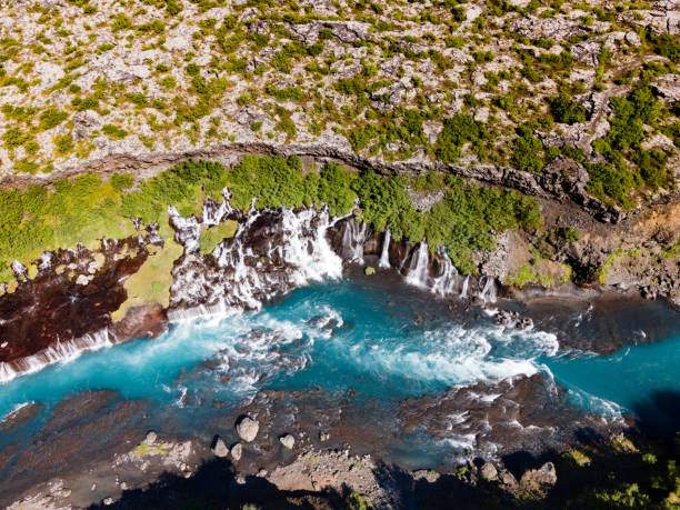 istock Blue waters passing by Hraunfossar waterfall 2159916911