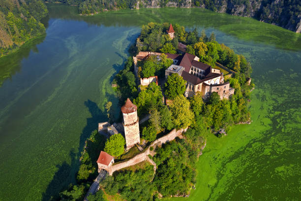 Zvikov castle is a well-preserved Gothic castle standing on a rock above the confluence of the Vltava and Otava rivers. It is considered one of the most beautiful medieval buildings in the Czech