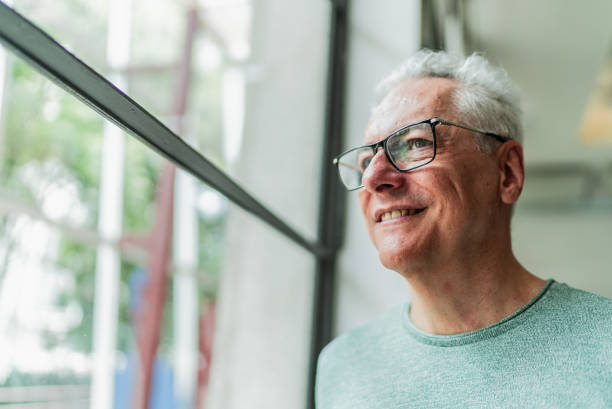 istock Senior man looking away contemplating 2159920637