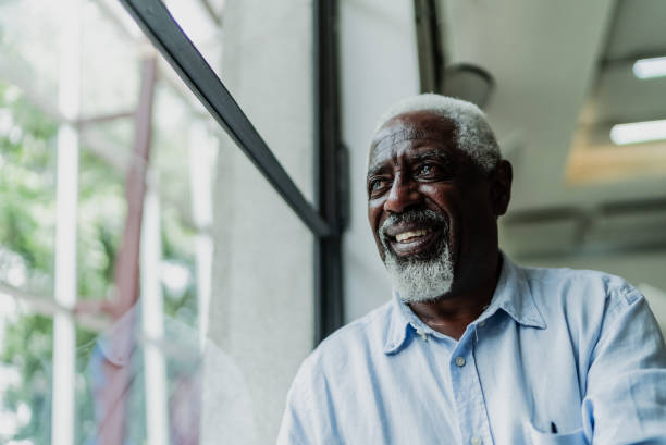 istock Senior man contemplating on library 2159920668