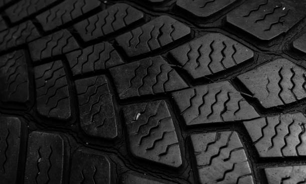 istock tire tread, tire traces background 2159920965