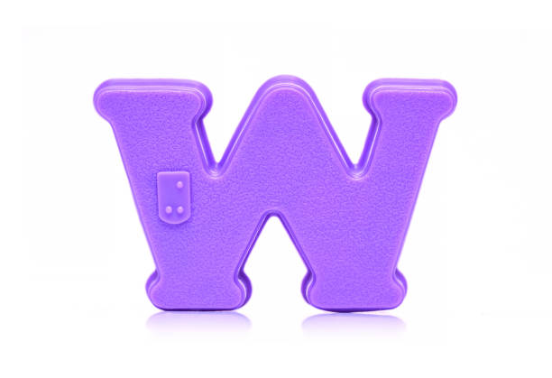 Plastic letter W isolated on white background.