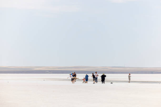Turkey, Ankara -June 26,2024: The healing effects of walking on foot ailments at Tuz Lake