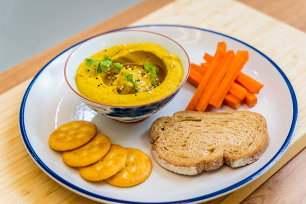 Nutritious and savory chickpea porridge with carrots.