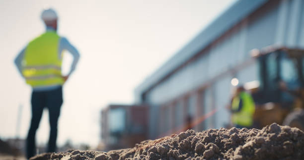 Construction, thinking and blur of man for planning, maintenance and architecture design. Thinking, civil engineering and contractor for manufacturing, storage warehouse and infrastructure ideas