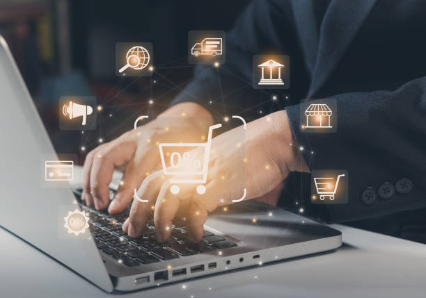 istock Businessman laptop using , online shopping concept. Shopper using a laptop computer with shopping cart and business icon, Online shopping and e-commerce technology internet concept. 2159935053